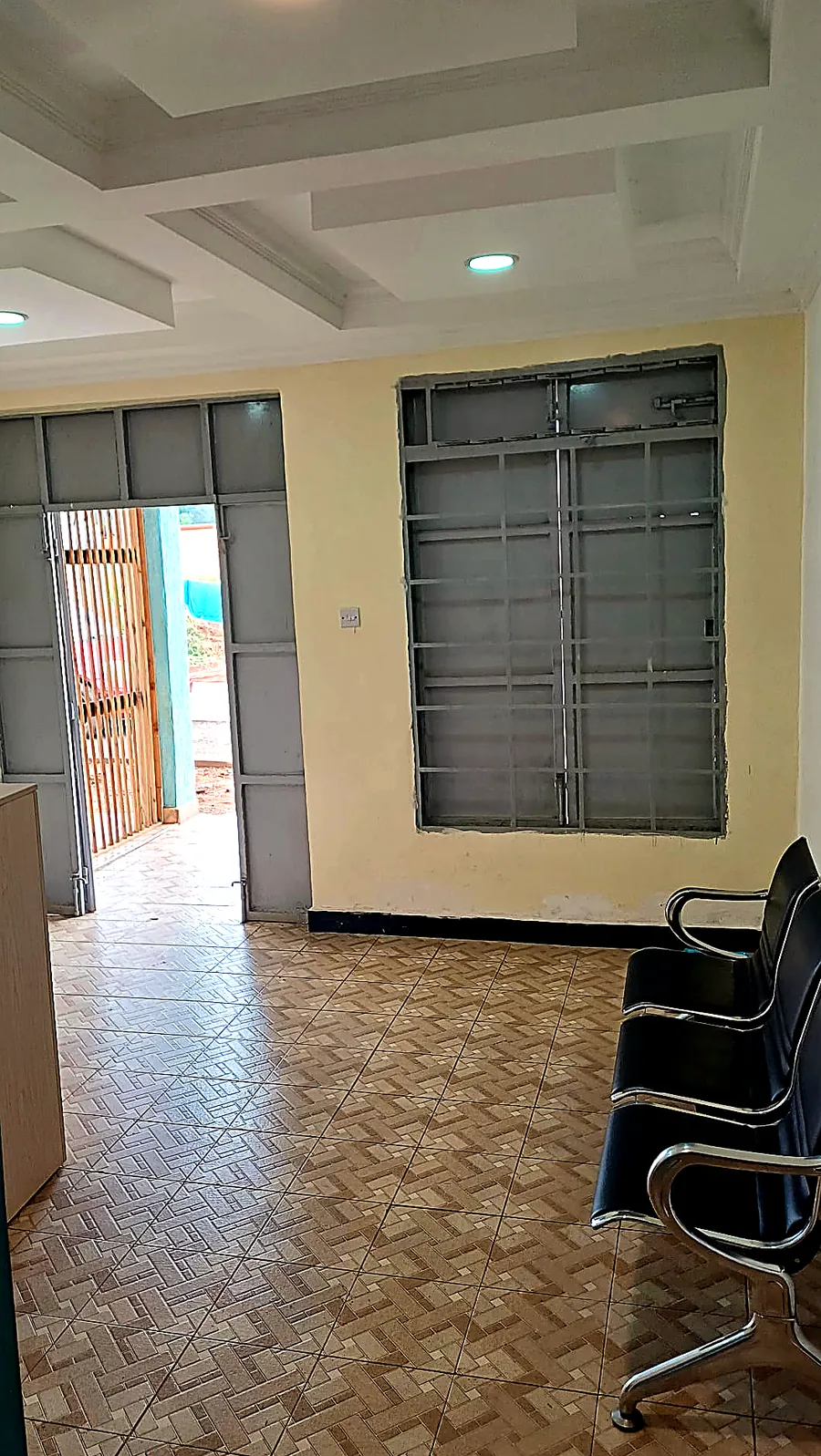 Interior hallway and waiting area of Laundry Oasis in Maseno